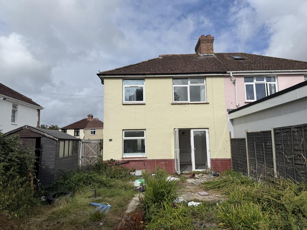 Lot: 124 - THREE-BEDROOM SEMI-DETACHED HOUSE - View of rear elevation with painted render